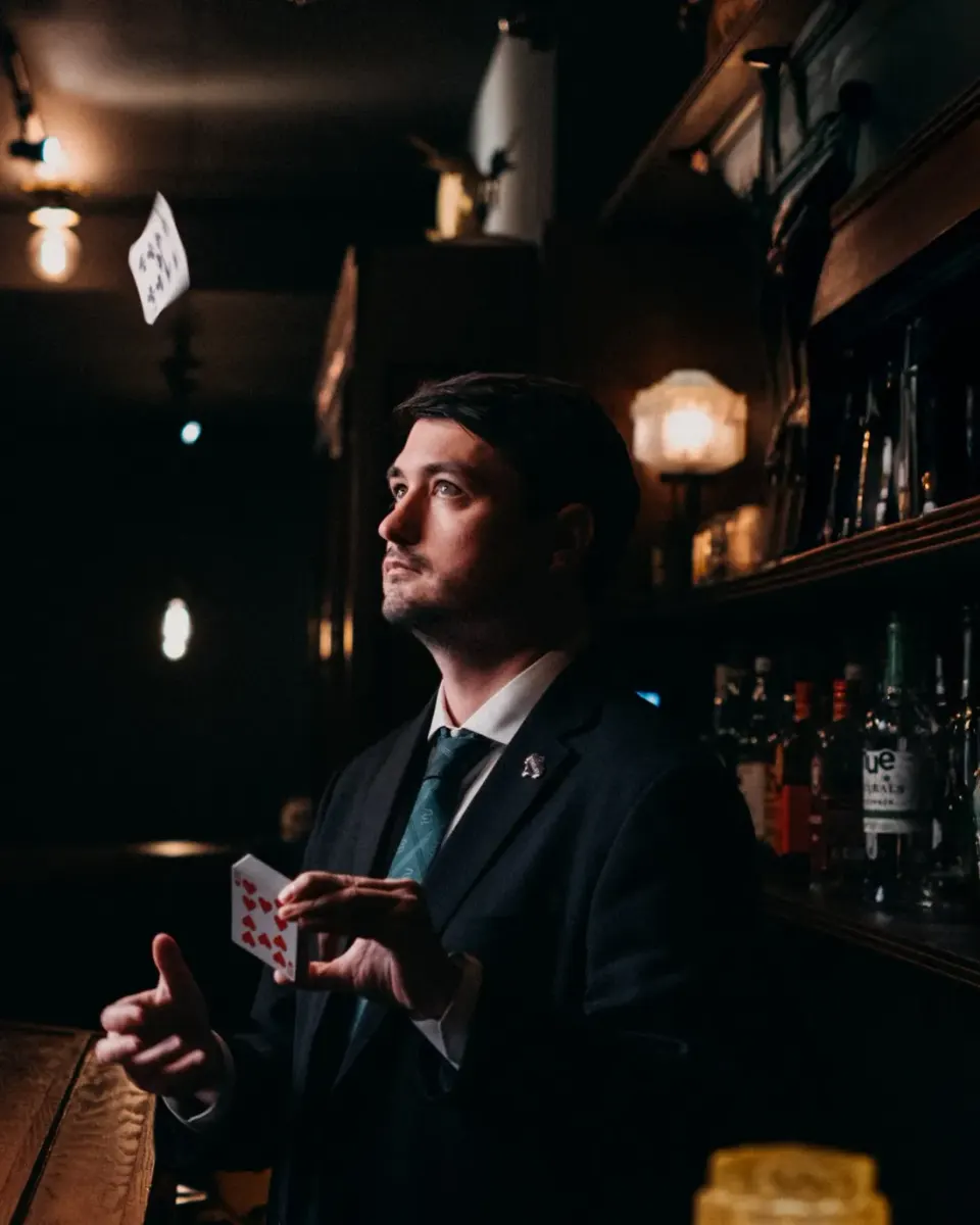Kansas City magician Josh Weidner performing close-up card magic
