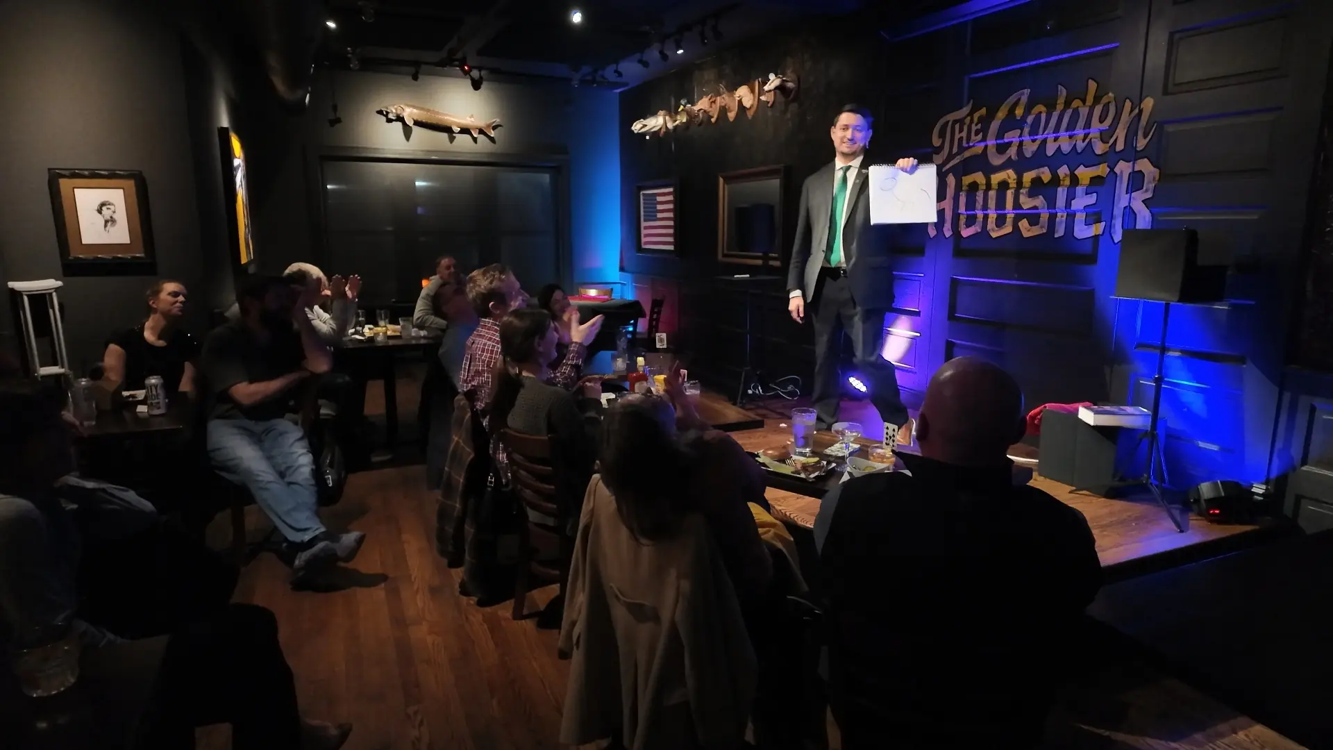 Audience applauding a reveal during the stage show at the St Louis magic show at the Golden Hoosier